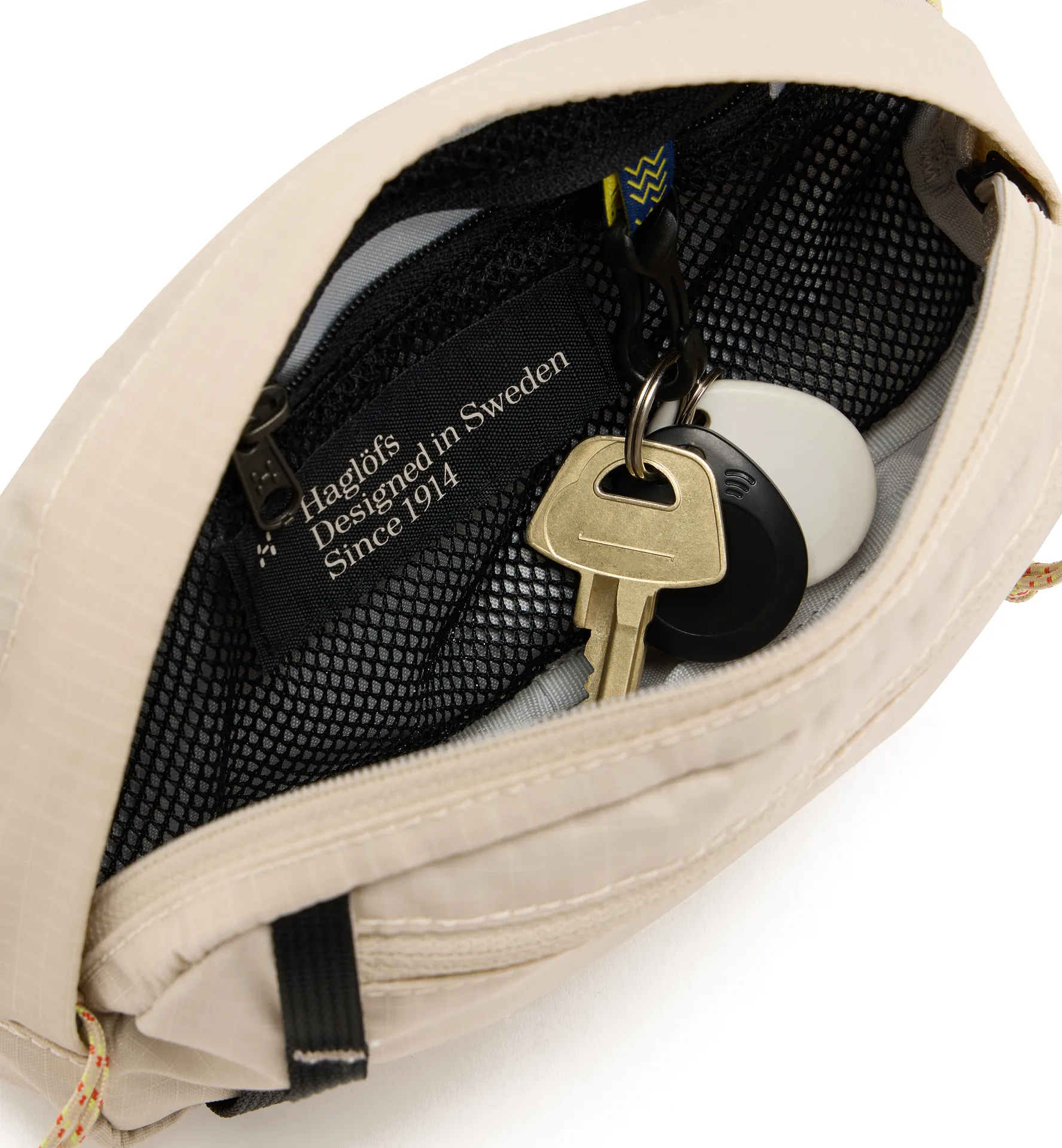 Tight hip pack 1 Chalk Beige/True Black