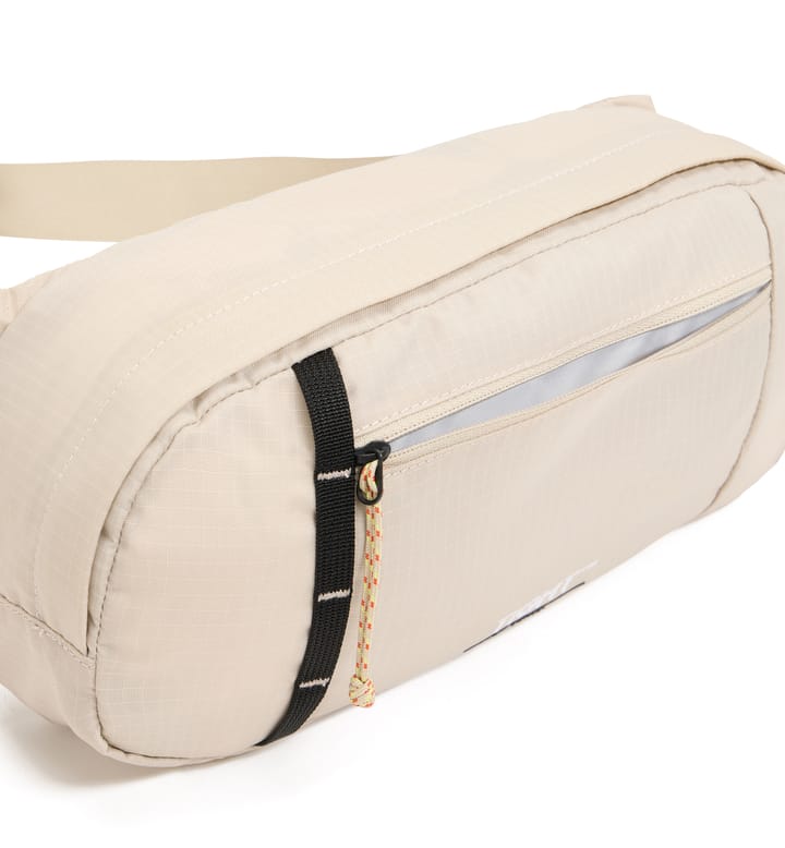 Tight hip pack 3,5 Chalk Beige/True Black Tight hip pack 3,5 Chalk Beige/True Black