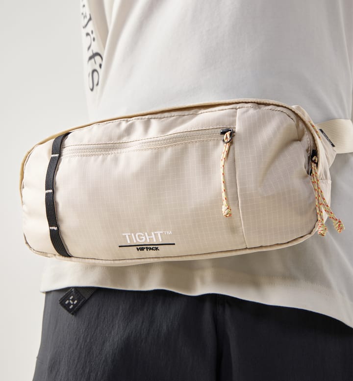 Tight hip pack 3,5 Chalk Beige/True Black Tight hip pack 3,5 Chalk Beige/True Black