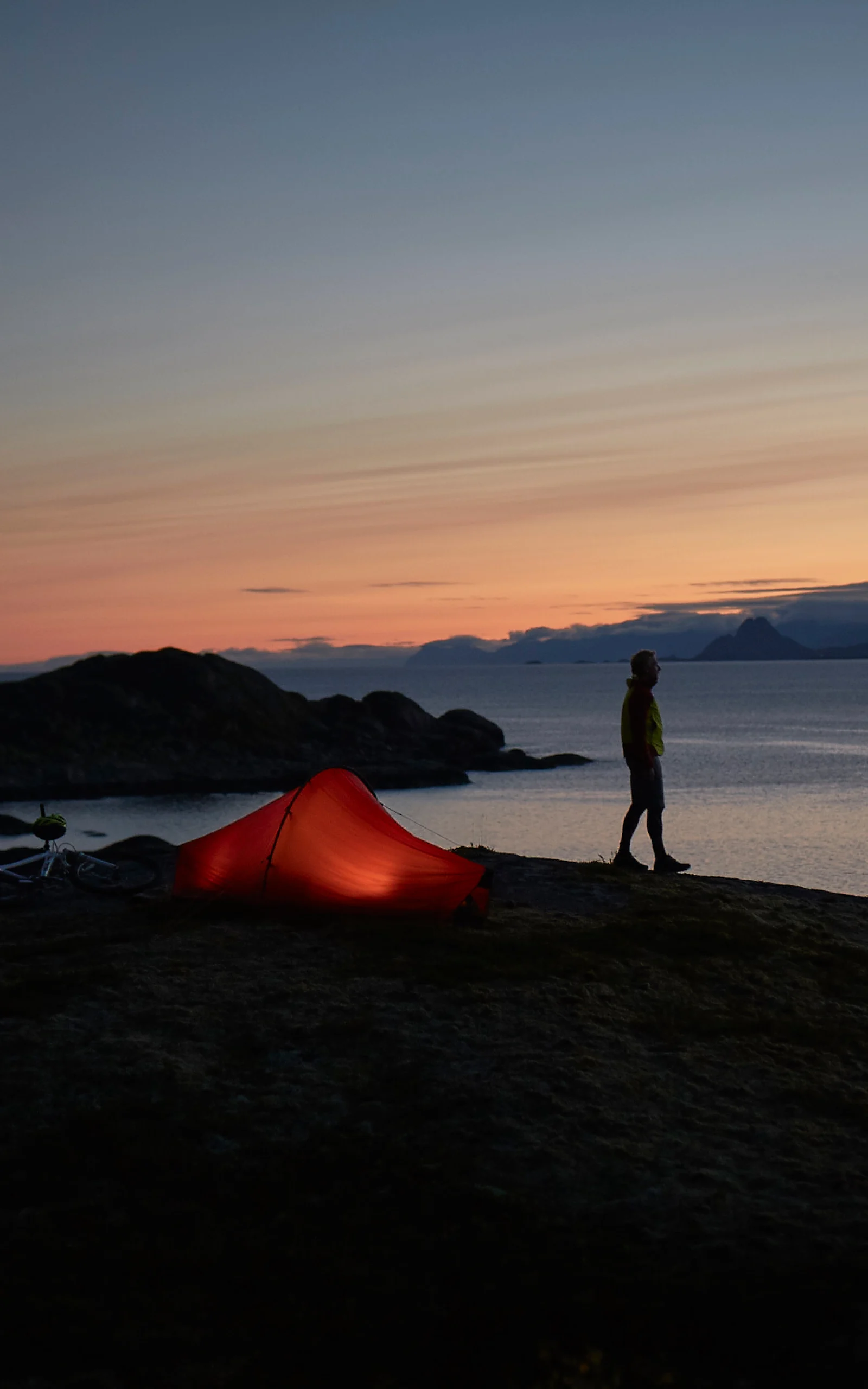 Watching the sunset with a tent and a Haglöfs sleeping bag