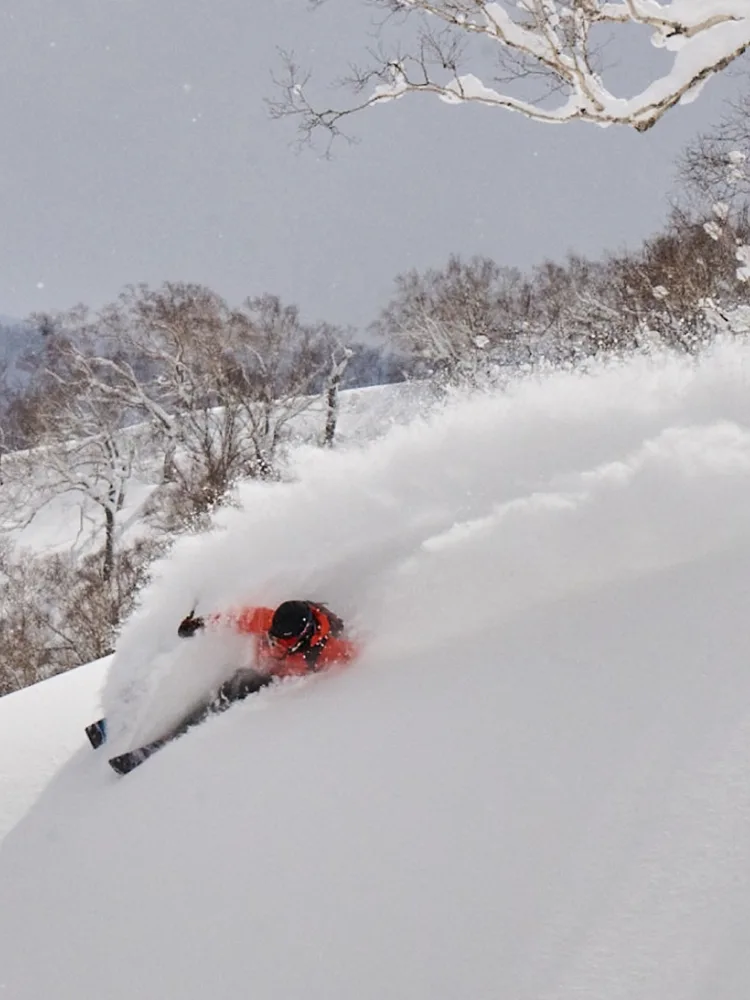 Takeshi Kodama skiing in Haglöfs clothes.