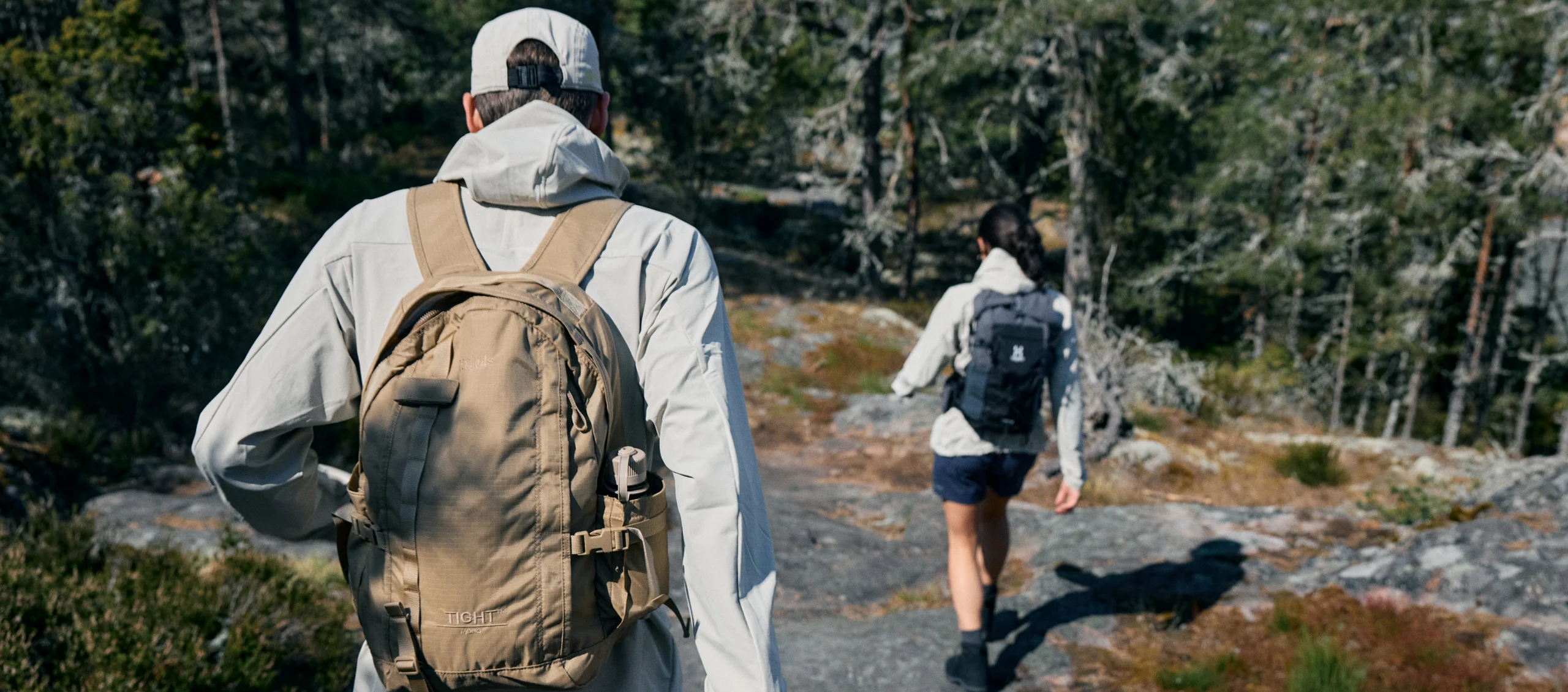 Man in the wild during a hike in Haglöfs clothes