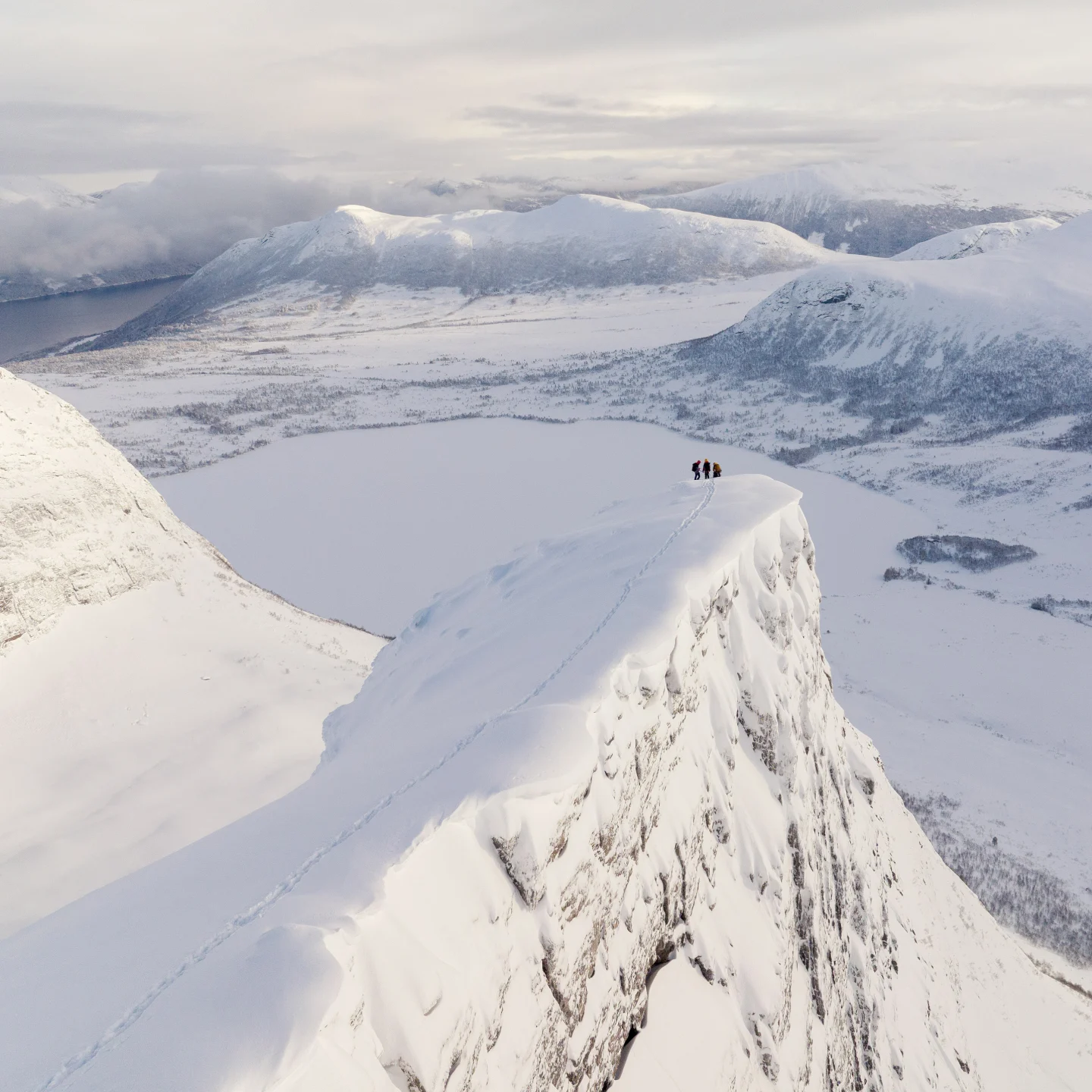 People up on a snowy mountain