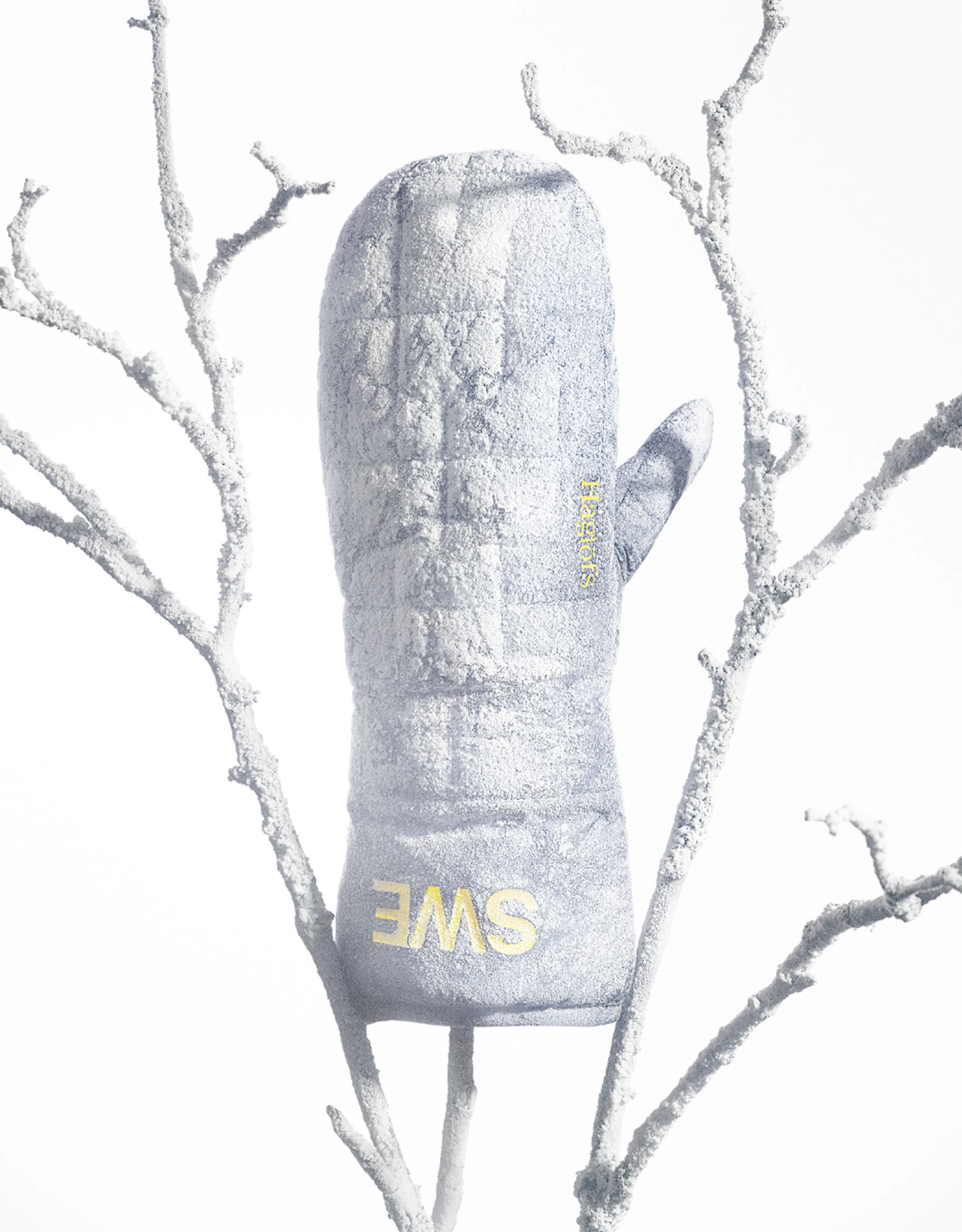 Haglöfs Winter olympic games OS mitten in white branches