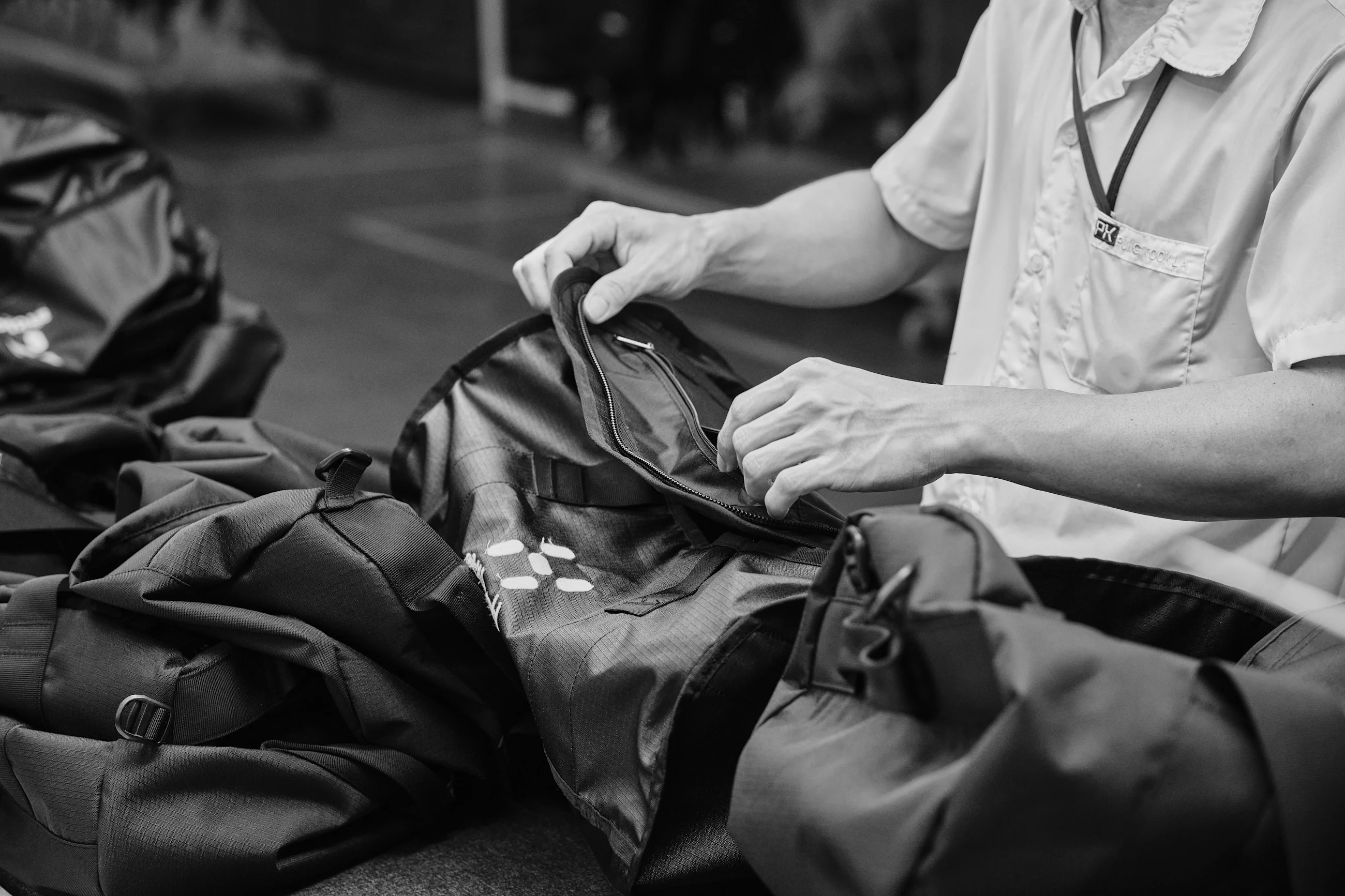 A man working with a Haglöfs bag.