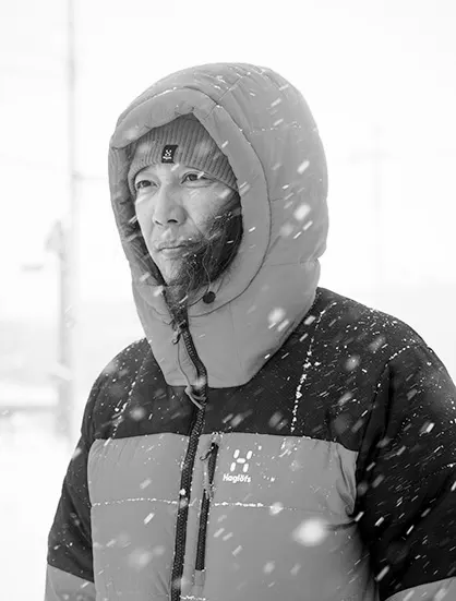 Tadahiro Yamaki outside in the snow wearing Haglöfs jacket Riksgränsen.