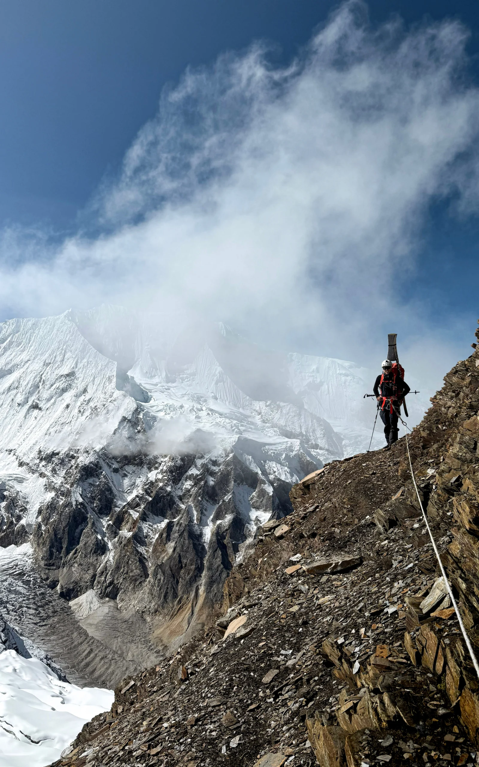 Haglöfs Outsiders by nature Oskar Normelli climbing a snowy mountain