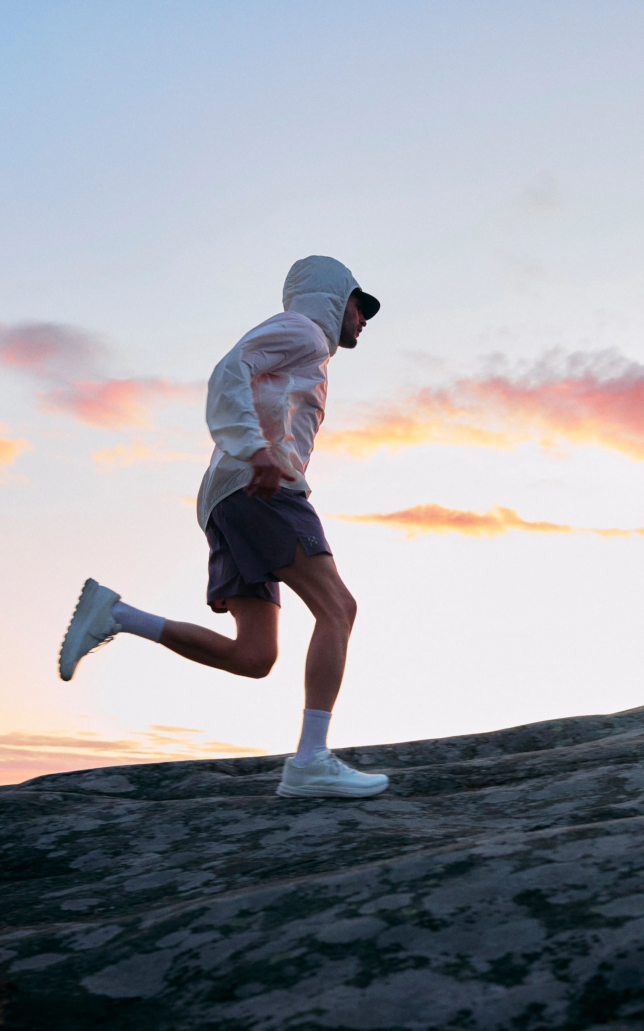 Haglöfs Lookbook Spring Summer 2026 Hero Man running up a rock