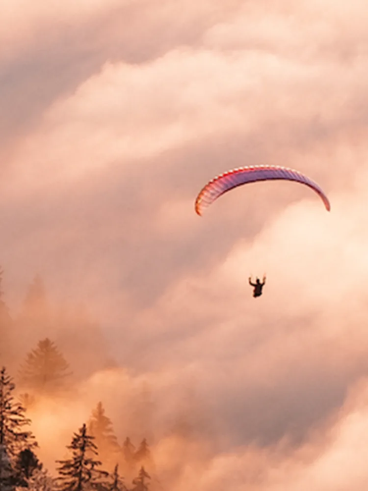Francois Montuori flying over a mountain