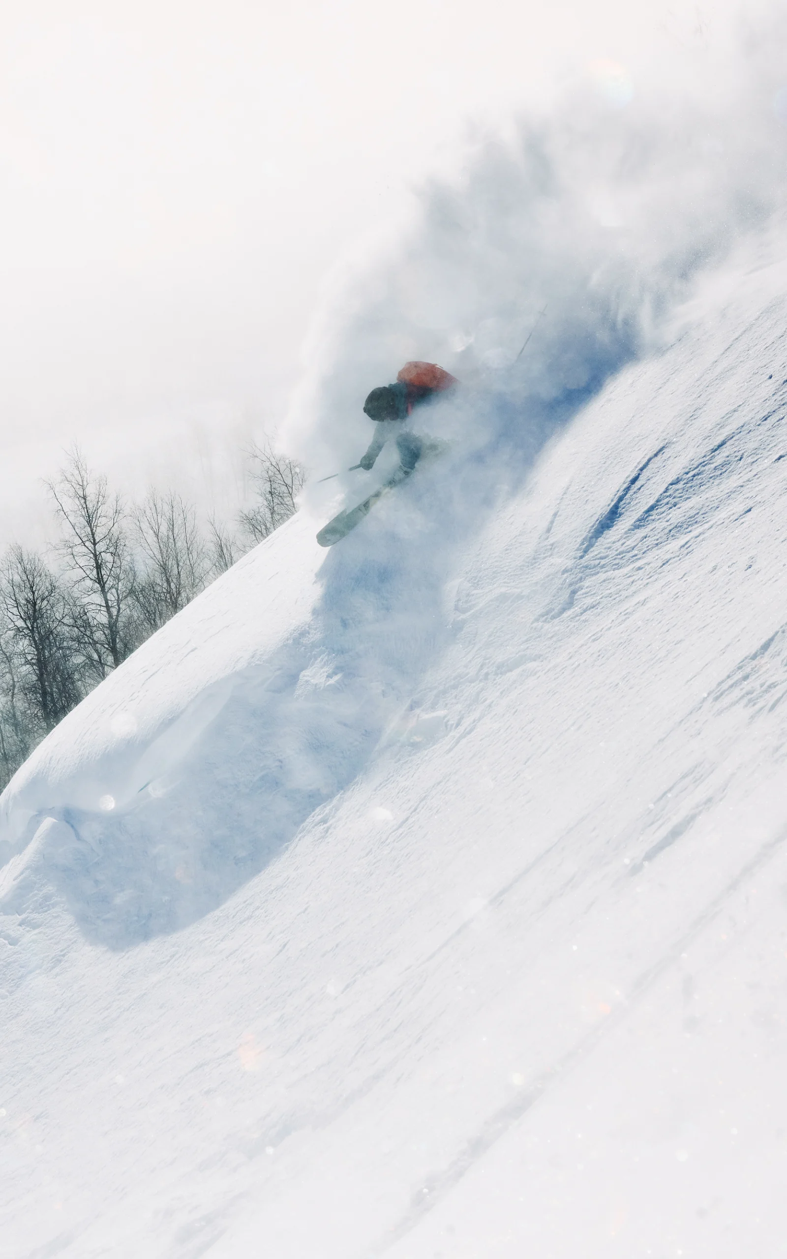 Haglöfs ski gear campaign. Skier going down the slopes