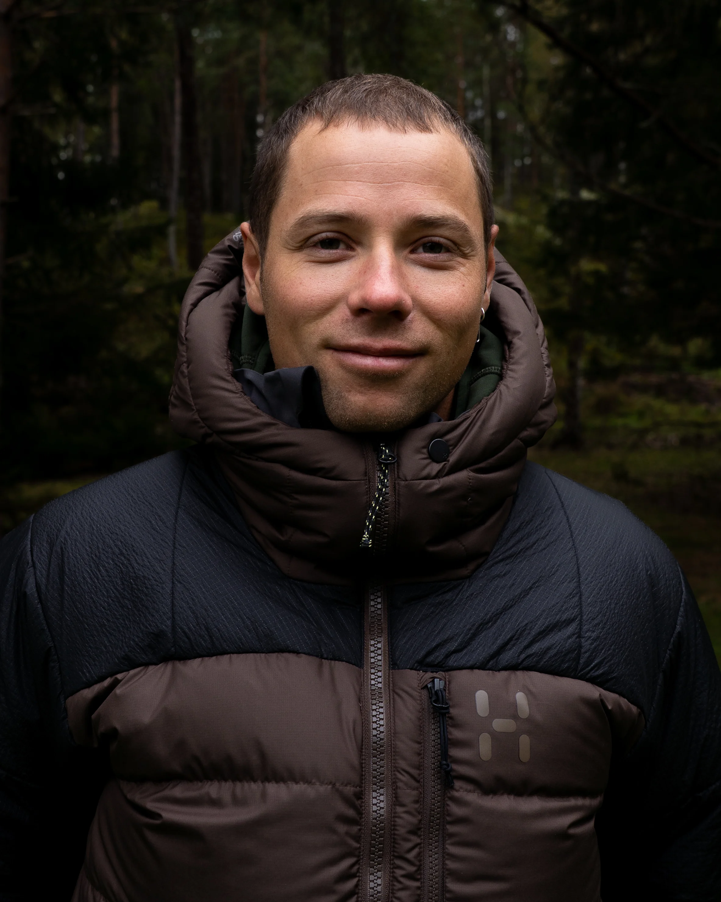 Profile image of Magnus Granér in a Haglöfs jacket in the woods
